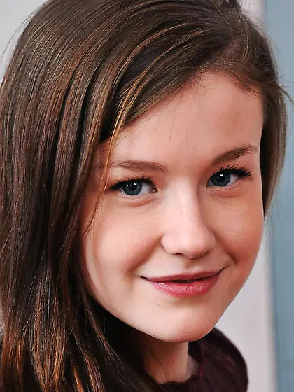 Lusty teen Emily Bloom is smiling showing perfectly shaved cunt