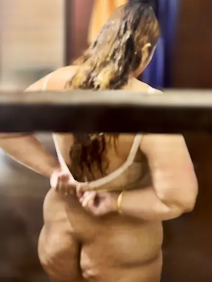 Secretly captured big ass rich MILF through window