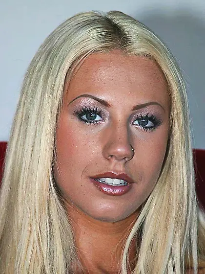 Tanned blonde Tanya James touches her perfect tits then removes