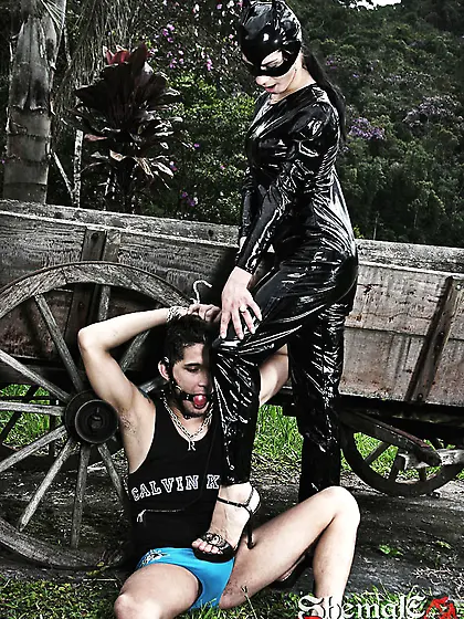 Adriana in extravagant outfit dominating a guy