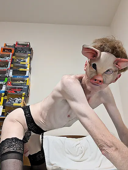 Me wearing various kink masks and fox tail butplug