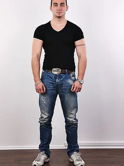 Short haired guy reveals his body