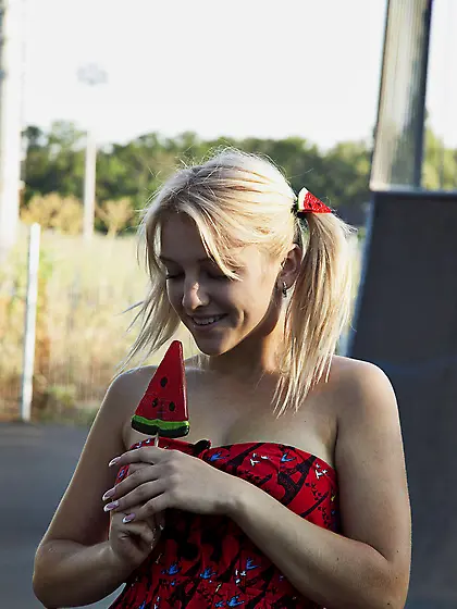 Innocent,  pigtailed blonde teen rollerblading and getting naked