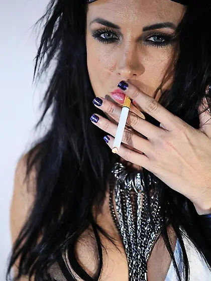 Hot smoking lady Alektra Blue is kinkily shaking her naked boobs