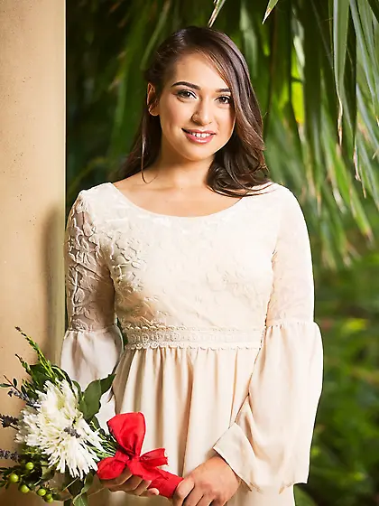 Happy young brunette pleases her boyfriend with outdoor strip-te