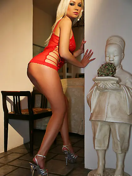 Wonderful woman having awesome boobs and white hair is demonstra