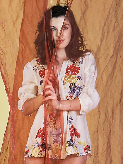 Curly babe takes wide