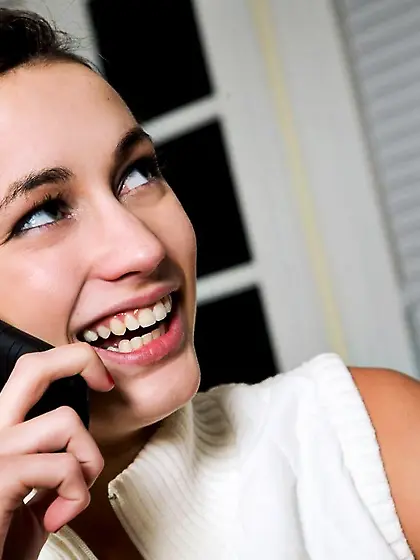 Luscious brunette Georgia Jones strips and sexily poses in front