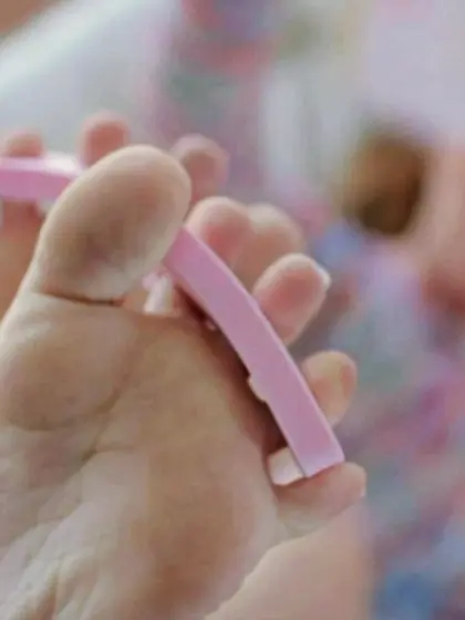 Busty blonde knockout sits