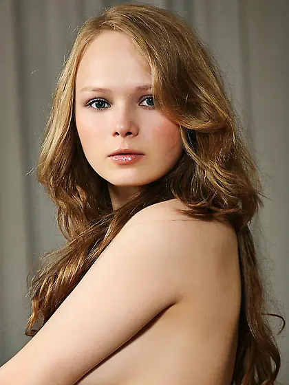 Young strawberry blonde bares