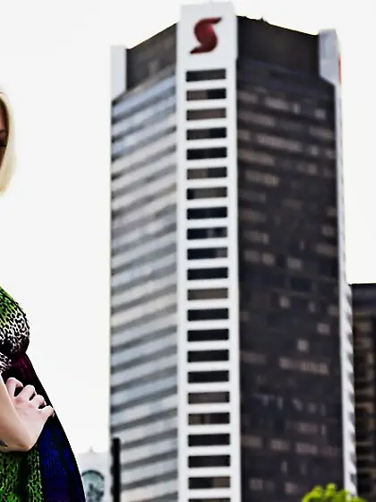 Camera follows sexy blonde babe Kelly Martin through the city wh