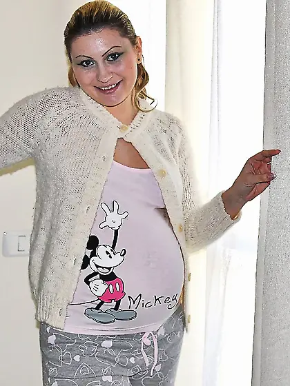 Pregnant girl in cardigan