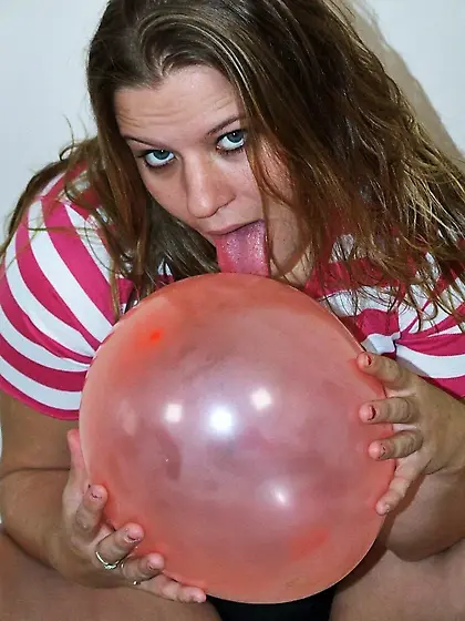 Christy Heart playing with Balloons