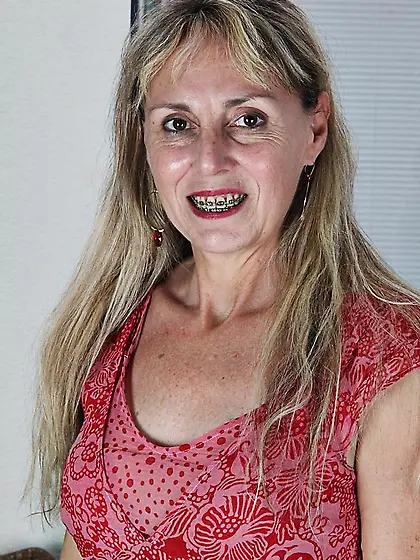 Hairy blonde MILF Sophie Karups slips out of her clothes and pla