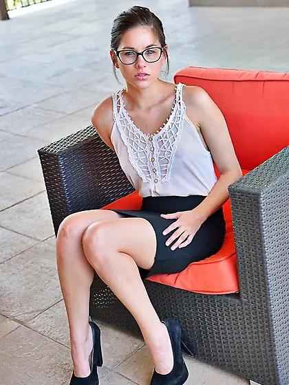 Female with glasses spreads pussy lips and shoves fist inside on