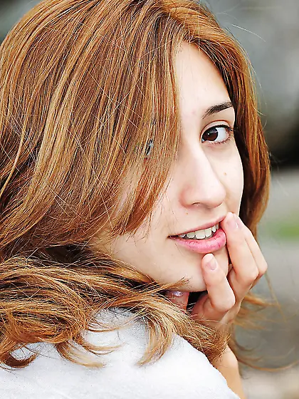 Redheaded Latina shows her gorgeous bushy twat while outside