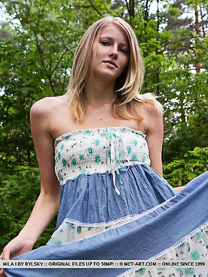 Gorgeous blonde lifts skirt