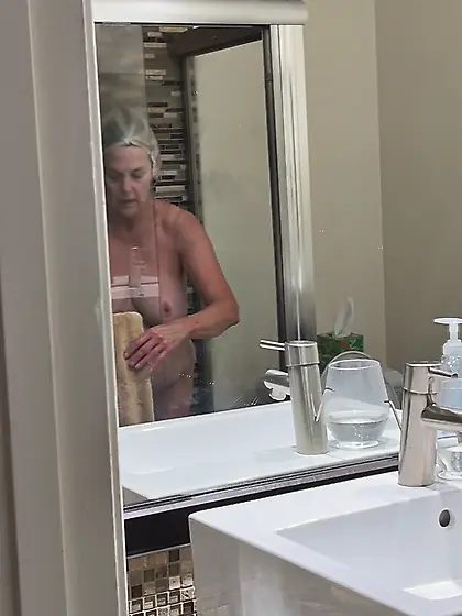 Wife exiting shower