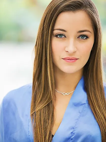 Snazzy teen poses in black stockings that accentuate her perfect