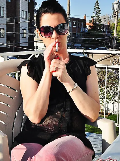 Fashionable black-haired babe black-top