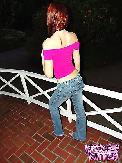 Cute redhead babe Kori Kitten strips her tight blue jeans and sh