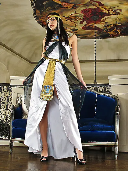 Wonderful brunette wearing luxurious clothes is demonstrating he