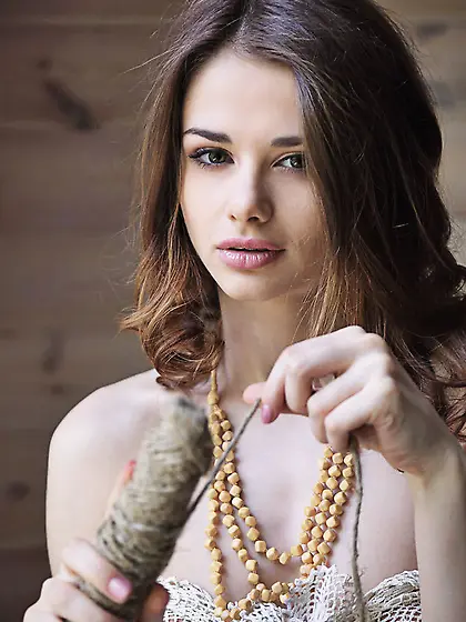 Seductive young girl enjoys luxurious life...