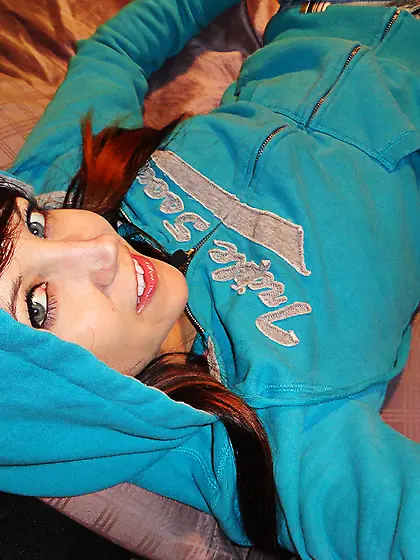 Hoodie-wearing brunette purple teasing