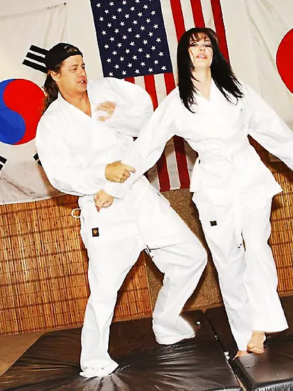 Foxy karate bitch Jezebelle Bond strips after practice and fucks