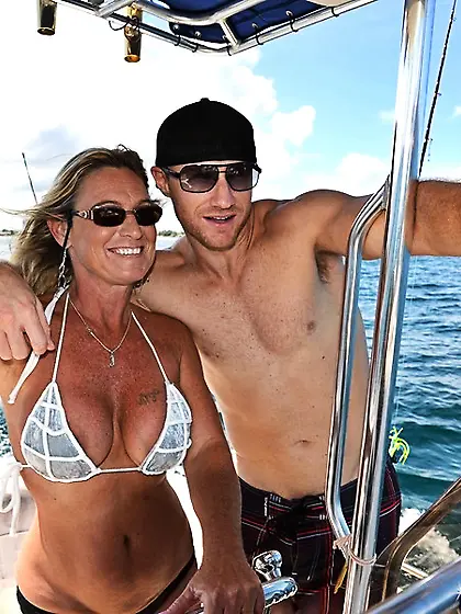 Busty cougar barely bikini