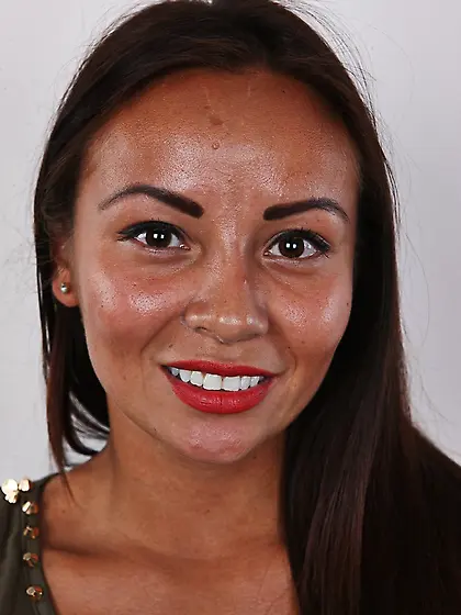 This exotic girl starts shyly,  but she is...