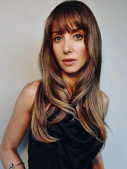 Alison Brie in a black dress