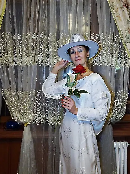 In Wedding Dress and White Hat