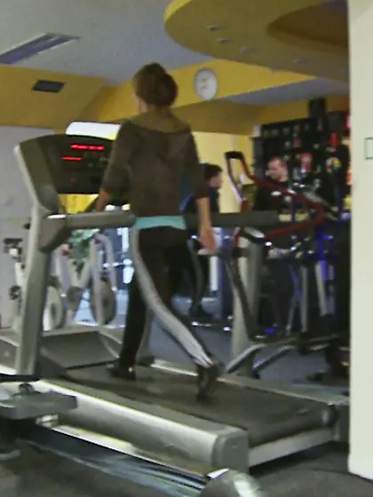 Ponytailed brunette rose thong