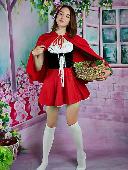Little Red Riding Hood gets back to basics wearing a simple birt