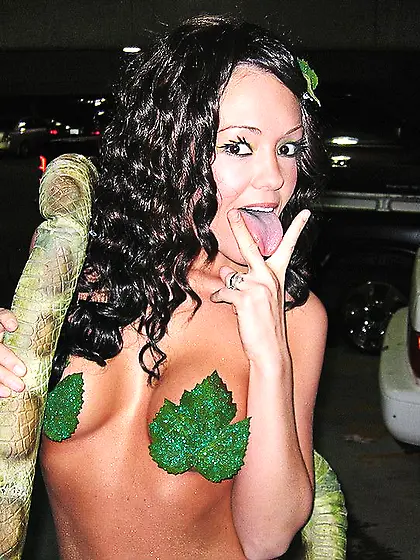 Frisky Foxy Jacky in sexy costume shows her tits and bald pussy