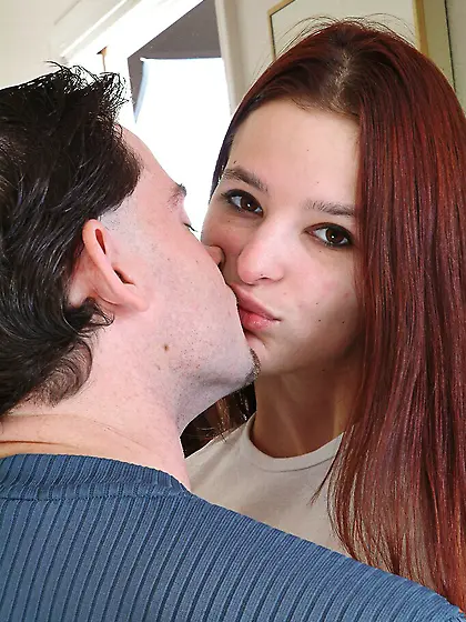 Red-haired teen Sophie Corday takes off her tight jeans and take