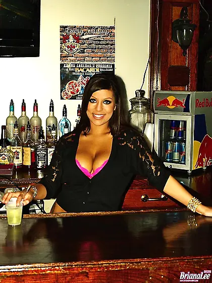 Naughty Latina girl Briana Lee is shaking her big naked tits dan