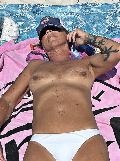 Sunbathing Topless in Florida