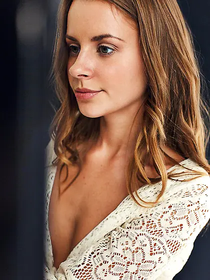 Golden haired sensual Lucia D plays with her shaved beaver on th