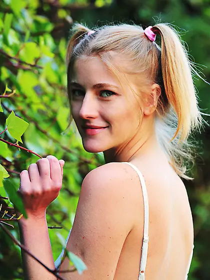 Pigtailed blonde with perky breasts eating an ice-cream naked,  o