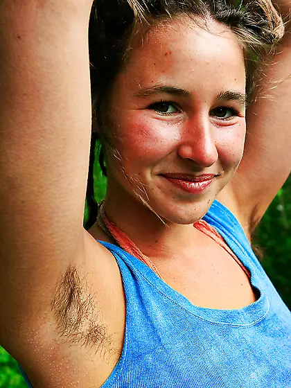 All natural girl with dreadlocks showing her bush and pits