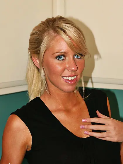 Sexy blonde doll Brynn Tyler gets naked in the kitchen and shows