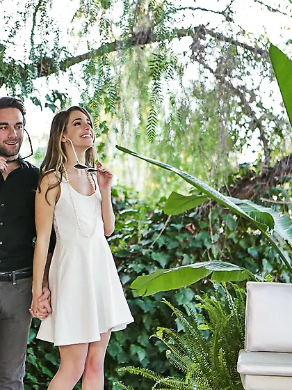 Girl with beads around neck and her boyfriend make love in the j