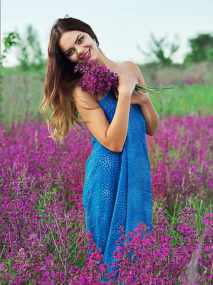 Young fresh and just sexy babe Sasha L is undressing at flower f