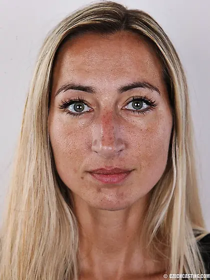 Tanned and sexy lady showing off her big boobies for you