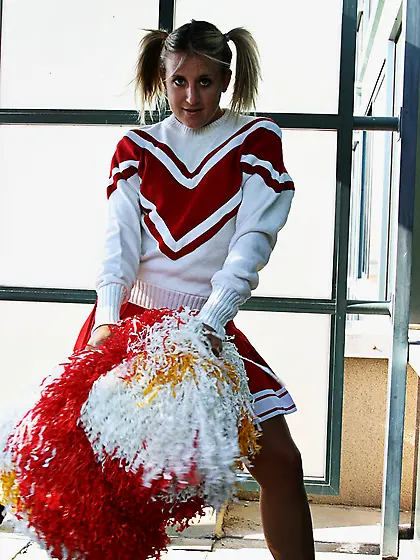 Pigtailed cheer girl Jules Van Saint removes her her underwear a