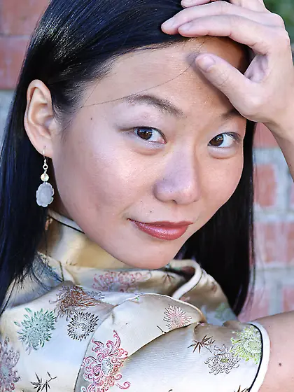 Asian doll Niya Yu takes off her ethnic dress and sexy thong pan