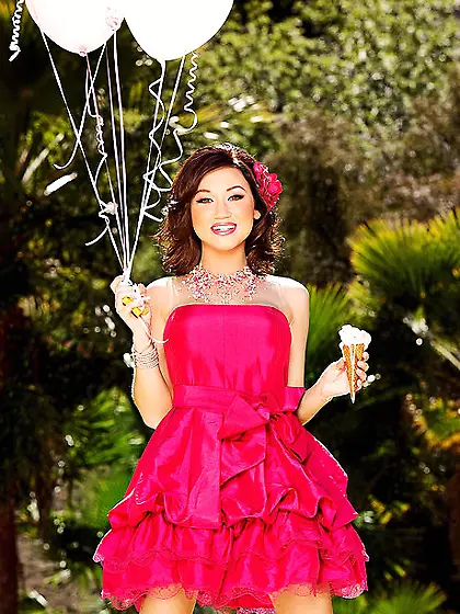 Petite pornstar gets rid of sexy dress and flashes huge tits in