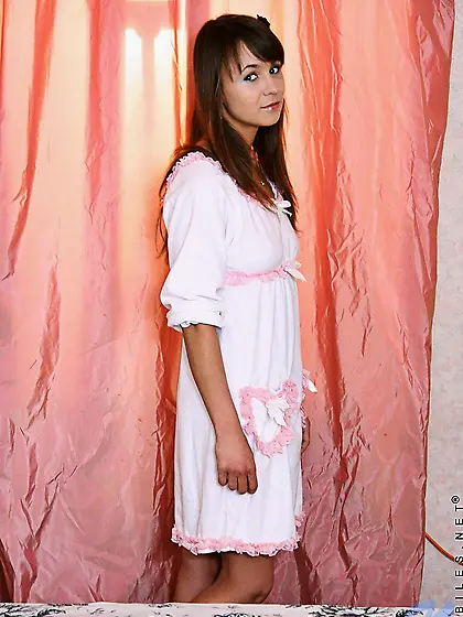 Brown haired teen Gasha Nubiles in white dress shows off her sex